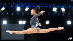 FILE - Hezly Rivera, of United States, competes on the balance beam during a women's artistic gymnastics qualification round at the 2024 Summer Olympics, July 28, 2024, in Paris, France.