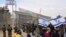 Protesters block the path for humanitarian aid bound for the Gaza Strip at the Nitzana border crossing with Egypt in southern Israel, Feb. 2, 2024. 