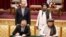 Uzbek Prime Minister Abdulla Aripov, back row, left, and Taliban Deputy Prime Minister for Economic Affairs Mullah Abdul Ghani Baradar, back row, right, oversee the signing of Memorandums of Understanding in Kabul, Afghanistan, Aug. 17, 2024. 