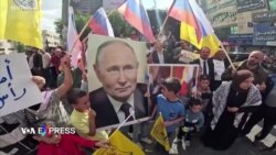 Người Palestine ở Hebron tuần hành đoàn kết với Gaza, giơ hình Putin và Kim Jong Un