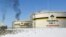 FILE - Reservoirs seen at Priobskoye oil field near Nefteyugansk, in western Siberia, Russia, on April 5, 2006. 