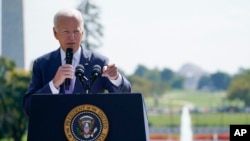 FILE - President Joe Biden speaks outside the White House in Washington, Oct. 2, 2023. The president said Wednesday that he'll tell Americans "it's overwhelmingly in the interest of the United States" that Ukraine be able to fend off Russia.