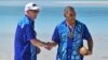 Perdana Menteri Australia Anthony Albanese, kiri, dan Perdana Menteri Tuvalu Kausea berjabat tangan di One Foot Island setelah menghadiri Leaders' Retreat selama Forum Kepulauan Pasifik di Aitutaki, Kepulauan Cook, 9 November 2023. (Foto: via AP)