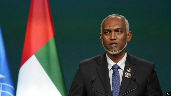 FILE - Maldives President Mohamed Muizzu speaks at the COP28 UN Climate Summit, Dec. 1, 2023, in Dubai, United Arab Emirates.