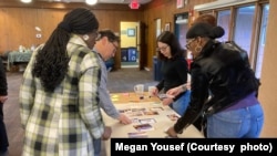 Debra Rosenthal, top right, worked to bring a climate change board game to her university class.