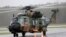 In this photo provided by the Australian Defence Force, an Australian Army MRH-90 Taipan helicopter from the School of Army Aviation prepares to take off from Ballina airport, Ballina, Australia, Feb 27, 2022.