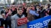 South Korean Trainee Doctors Continue Strike, Risking Prosecution 