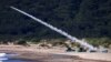(FILE) A Taiwanese military soldier launches a US made Stinger missile during a live-firing exercise in Taiwan.