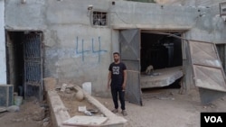 The home of Hani Elbah, pictured here on Sept. 24, 2023, like so many others, was washed away by the Sept. 11 floods in Derna, Libya, that killed thousands. (Atiyah Alhasadi/VOA)