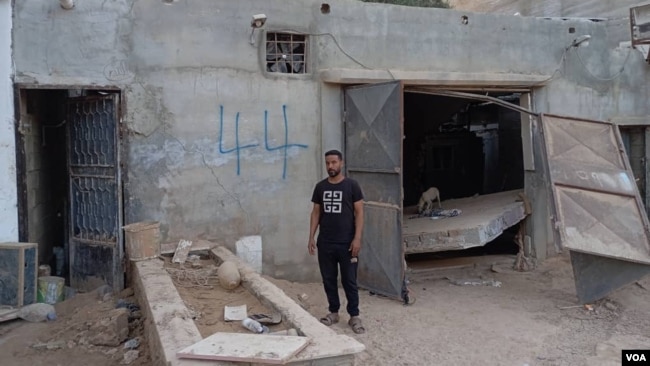 The home of Hani Elbah, pictured here on Sept. 24, 2023, like so many others, was washed away by the Sept. 11 floods in Derna, Libya, that killed thousands. (Atiyah Alhasadi/VOA)