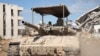 Cette photo diffusée par l'armée israélienne le 28 août 2024 montre un char de combat israélien lors d'opérations de destruction d'un tunnel dans le corridor central de Gaza par la 16e Brigade. (Photo de l'armée israélienne / AFP)