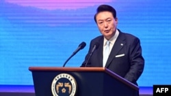 South Korea's President Yoon Suk Yeol speaks during a ceremony held to celebrate the 79th Korean National Liberation Day at the Sejong Center of the Performing Arts in Seoul, Aug. 15, 2024.