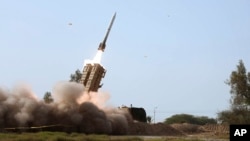 FILE - A missile is launched during a drill in southern Iran in this photo released by the Iranian army's website on Jan. 19, 2024. Iran on Sept. 12, 2024, summoned four European envoys to condemn their countries' accusations that Iran supplied ballistic missiles to Russia.