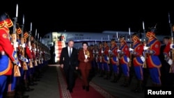 Russian President Vladimir Putin takes part in a welcoming ceremony upon his arrival at an airport in Ulaanbaatar, Mongolia, Sept. 2, 2024. (Sputnik/Pool via Reuters)