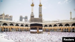 Muslims perform their Friday prayers in the Grand Mosque in the holy city of Mecca, Saudi Arabia, June 23, 2023 in this photo released by the Saudi Press Agency.