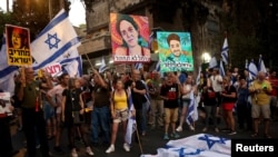 People attend a demonstration calling for the immediate return of hostages held in Gaza, near Israeli Prime Minister Benjamin Netanyahu's residence in Jerusalem, Sept, 2, 2024.