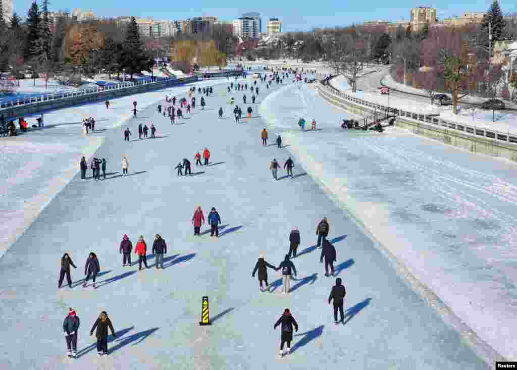 The frozen 7.8-km (4.9-mile) Rideau Canal Skateway, the world&#39;s largest natural ice skating rink, re-opens for the first time in two years, in Ottawa, Ontario, Canada, Jan. 21, 2024.