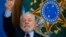 Brazil's President Luiz Inacio Lula da Silva gives a thumbs-up sign during a breakfast with journalists at Planalto presidential palace in Brasilia, Brazil, Oct. 27, 2023.