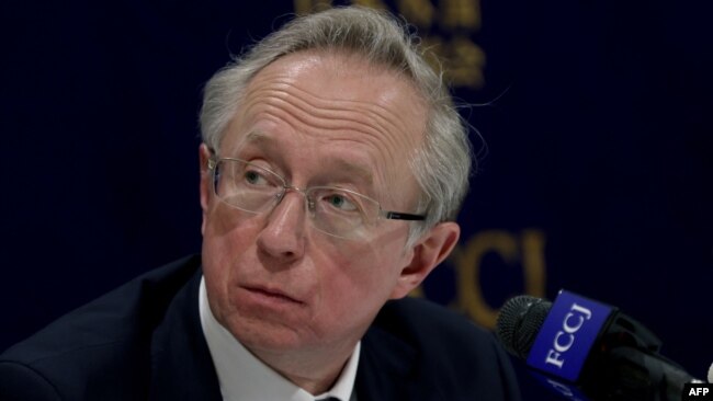 Russian Deputy Foreign Minister Mikhail Galuzin attends a press conference in Tokyo on Feb. 25, 2022.