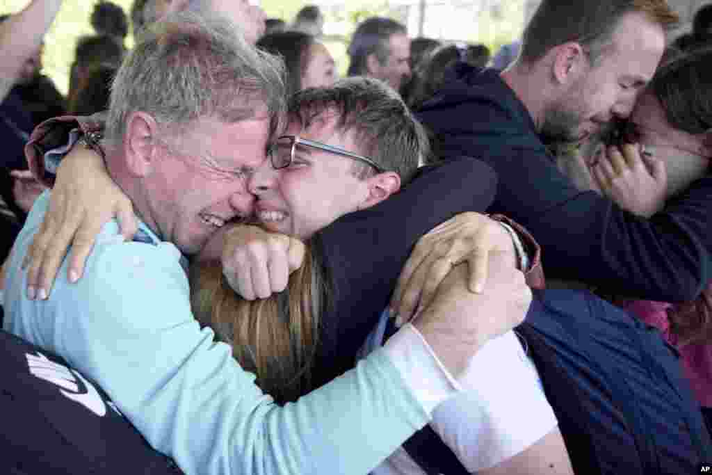 An Argentinian who was caught in the latest Israel-Hamas war is greeted by relatives as he arrives to the airport Buenos Aires, Argentina.