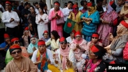 Supporters of Bangladesh Nationalist Party (BNP) chant slogans as they join in a rally, days after the resignation of former Prime Minister Sheikh Hasina, in Dhaka, Aug. 7, 2024.