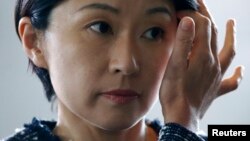 2014年9月3日日本的经济，贸易和工业部长小渊优子来到首相安倍晋三东京官邸