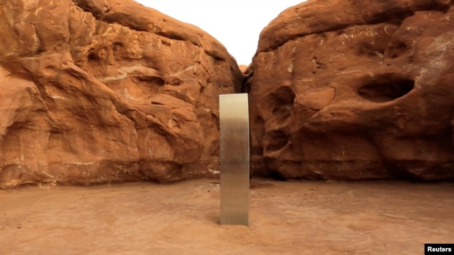 A metal monolith is seen in Red Rock Desert, Utah, U.S., November 25, 2020, in this still image obtained from a social media video. @davidsurber_ via REUTERS