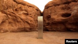 A metal monolith is seen in Red Rock Desert, Utah, U.S., November 25, 2020, in this still image obtained from a social media video. @davidsurber_ via REUTERS