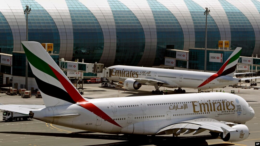 FILE - Emirates passenger planes are seen at Dubai airport in United Arab Emirates, May 8, 2014. 