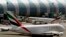 FILE - Emirates passenger planes are seen at Dubai airport in United Arab Emirates, May 8, 2014. 