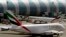 FILE - Emirates passenger planes are seen at Dubai airport in United Arab Emirates, May 8, 2014. 