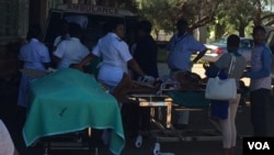 Some of the injured being admitted to a hospital.