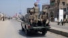 Pakistan army soldiers patrol the streets of Dera Ismail Khan