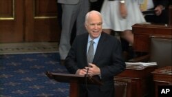 FILE - In this image from video provided by Senate Television, Sen. John McCain, R-Ariz. speaks the floor of the Senate on Capitol Hill in Washington, July 25, 2017. McCain returned to Congress for the first time since being diagnosed with brain cancer.