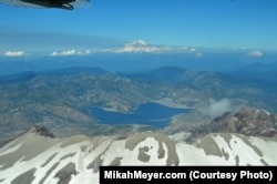 From the air, Mikah had a good view of Mount Rainier, Spirit Lake and Mount St. Helens.