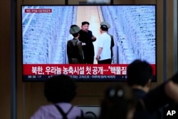 A TV screen shows an image of North Korean leader Kim Jong Un during a news program at the Seoul Railway Station in Seoul, South Korea, Sept. 13, 2024. The letters read, "North Korea, unveiling the uranium enrichment facility for the first time."