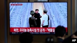 A TV screen shows an image of North Korean leader Kim Jong Un during a news program at the Seoul Railway Station in Seoul, South Korea, Sept. 13, 2024. The letters read, "North Korea, unveiling the uranium enrichment facility for the first time." 