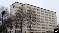 FILE - The exterior of the University Hospital in Enkoping, Sweden, is seen in this Feb. 4, 2009 photo. Officials say a Swedish hospital has reported a suspected case of the deadly Ebola virus; results of the medical test are expected Jan. 4, 2019.