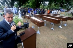 FILE—Federal police superintendent Jose Roberto Peres speaks during a burial service for nine unidentified migrants, at the Sao Jorge cemetery, in Belem, Para state, Brazil, April 25, 2024.