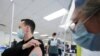 A man is vaccinated at a monkeypox vaccination clinic run by CIUSSS public health authorities in Montreal, Quebec, Canada, on June 6, 2022. (Christinne Muschi/Reuters)