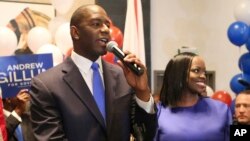 Andrew Gillum and his wife, R. Jai Gillum addresses his supporters after Andrew Gillum won the Democratic primary for governor, Aug. 28, 2018, in Tallahassee, Florida. 