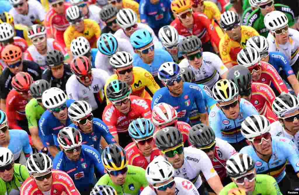 Riders compete in the Men&#39;s Elite Road Race, a 258.2-kilometer route around Imola, Emilia-Romagna, Italy, during the UCI 2020 Road World Championships.