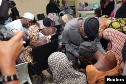 Some of the 21 Chibok school girls released are seen during a meeting with Nigeria's Vice President Yemi Osinbajo in Abuja, Nigeria, Oct. 13, 2016.