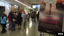 Audience members arrive for a screening of 'First They Killed My Father,' the Angelina Jolie film adaptation of an English-language memoir of a 5-year-old girl who witnessed the Khmer Rouge takeover of Cambodia in 1975.