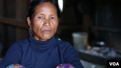 Lmam Pjanh, 45, a Kachork ethnic villager in the northeast Cambodia’s Rattanakiri province, lost some six hectares of farm land to Vietnamese agribusiness giant Hoang Anh Gia Lai (HAGL). (Sun Narin/VOA Khmer)