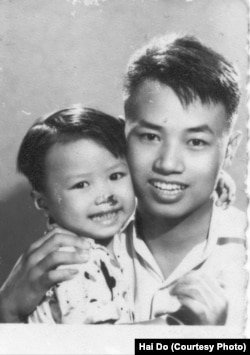 FILE - Hai Do is shown with his father, Hoe Do.