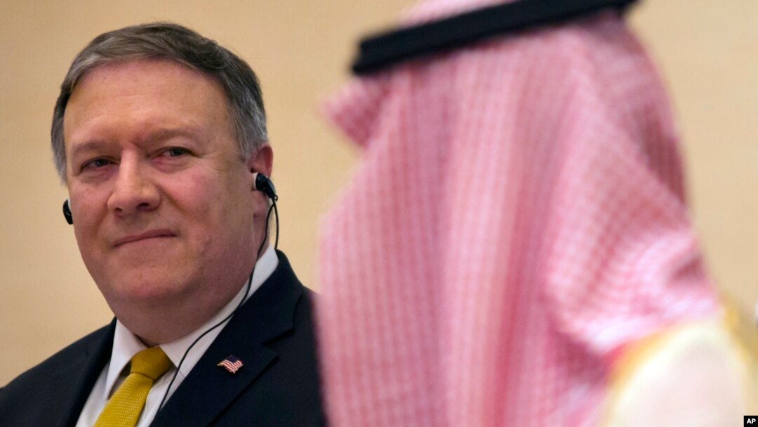U.S. Secretary of State Mike Pompeo, left, listens to Saudi Arabia's Foreign Minister Adel al-Jubeir, during a joint press conference at the Royal Terminal of King Khaled airport, in Riyadh, Saudi Arabia, Sunday, April 29, 2018. ob