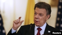 Colombian President Juan Manuel Santos, shown speaking at a Washington news conference, Feb. 5, 2016, says U.S. medical investigators will soon arrive in his country to help investigate the Zika virus. 