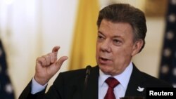 Colombian President Juan Manuel Santos, shown speaking at a Washington news conference, Feb. 5, 2016, says U.S. medical investigators will soon arrive in his country to help investigate the Zika virus. 