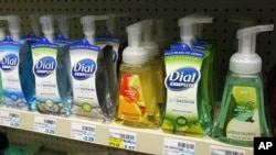 FILE - Soaps containing the antibacterial chemical on a store shelf at a Minneapolis pharmacy.